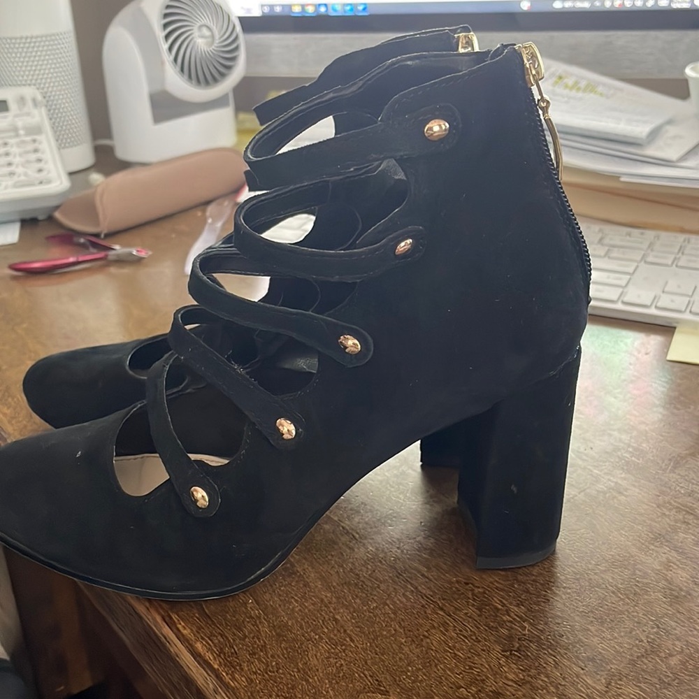 Cute chunky heels with gold accent and zipper, worn one time! Leather upper